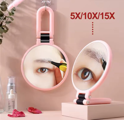 Espejo con doble aumento