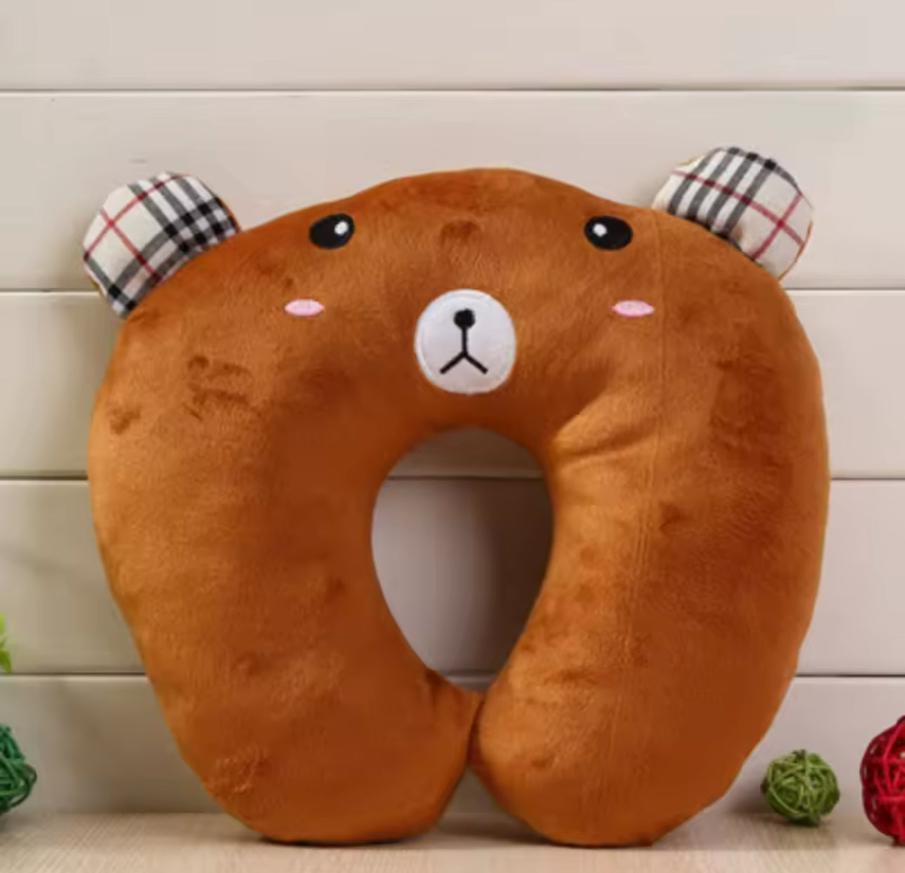 Almohada suave de felpa en forma de U